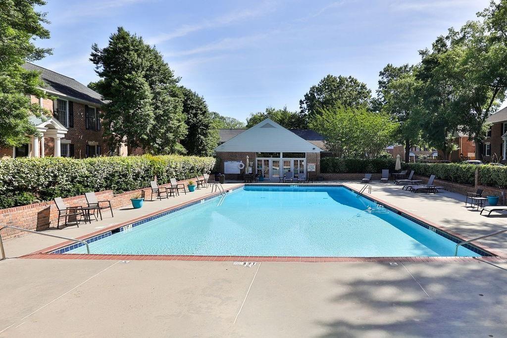 6700 Roswell Road, Unit 31B Atlanta, GA 30328 - Photo 30 of 32 a view of house with outdoor space and swimming pool
