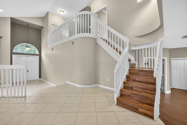 a view of entryway with wooden floor