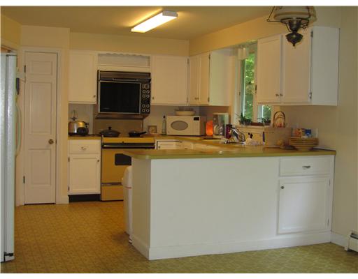 70 Pierce Road North Kingstown, RI 02874 - Photo 5 of 6 Kitchen. Kitchen with eating area opens to family room