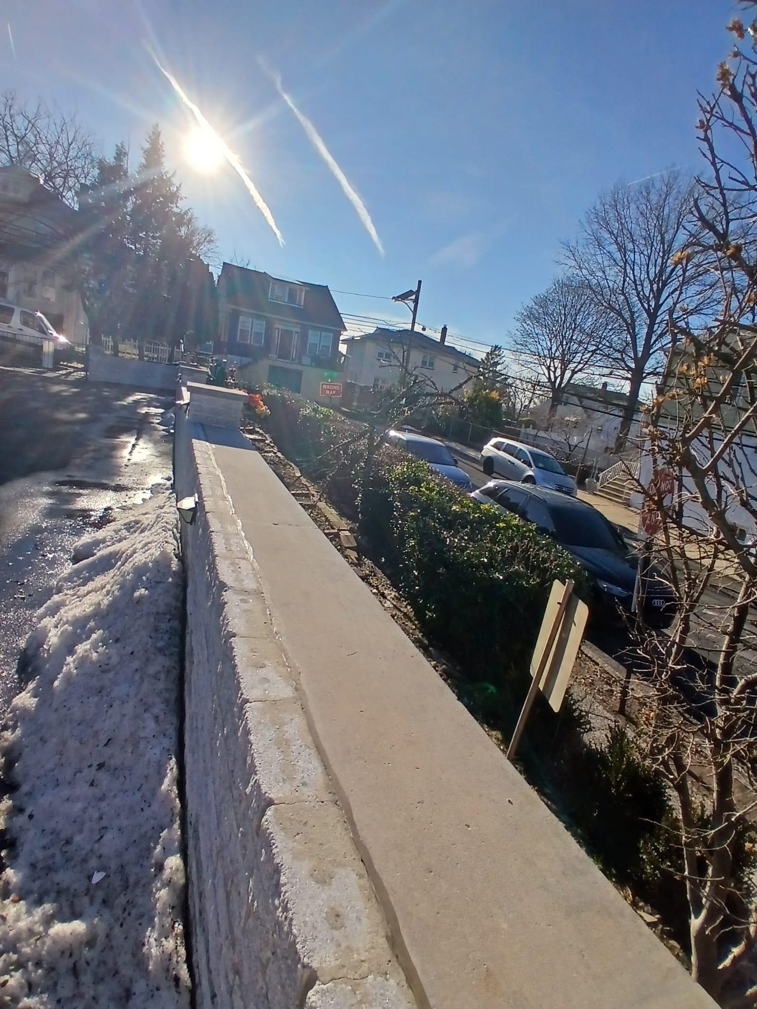 1212 89th Street North Bergen, NJ 07047 - Photo 12 of 41 a view of a pathway both side of building