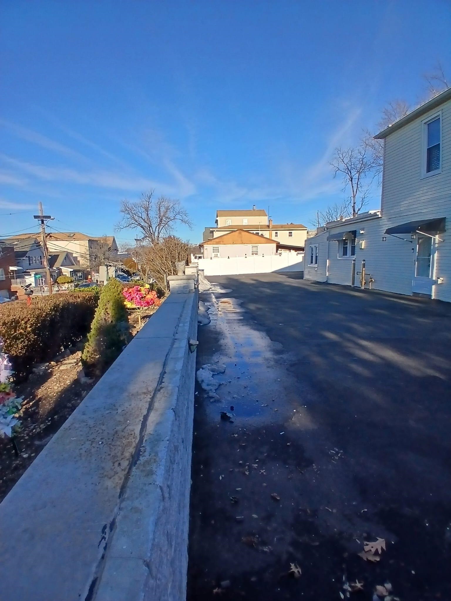 1212 89th Street North Bergen, NJ 07047 - Photo 15 of 41 a view of a house with a yard