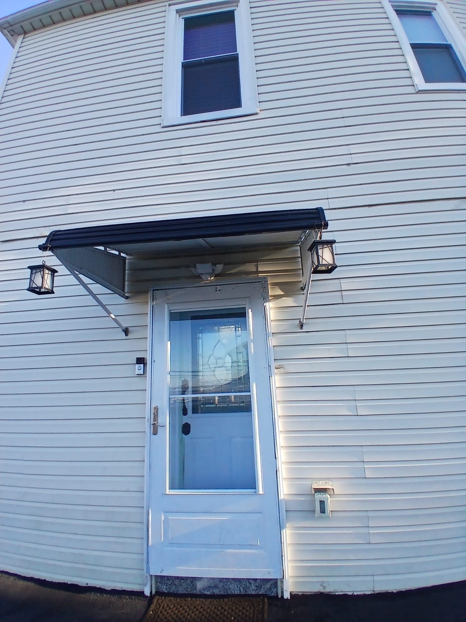 1212 89th Street North Bergen, NJ 07047 - Photo 22 of 41 a view of a house with a door