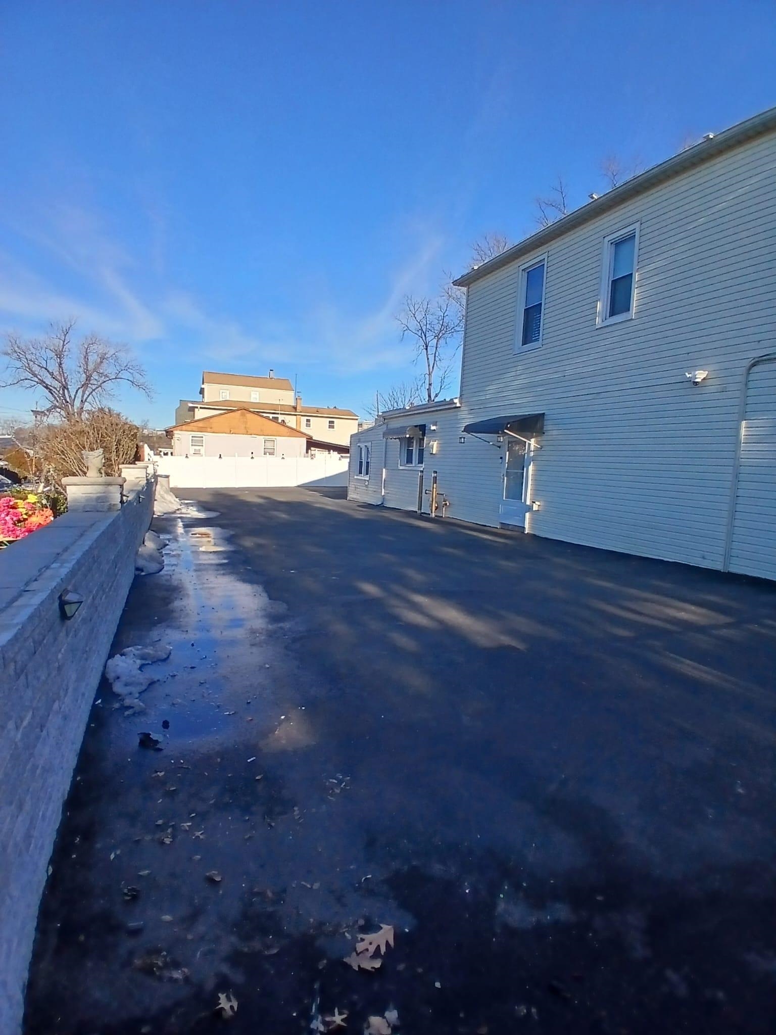1212 89th Street North Bergen, NJ 07047 - Photo 29 of 41 a view of a house with a yard