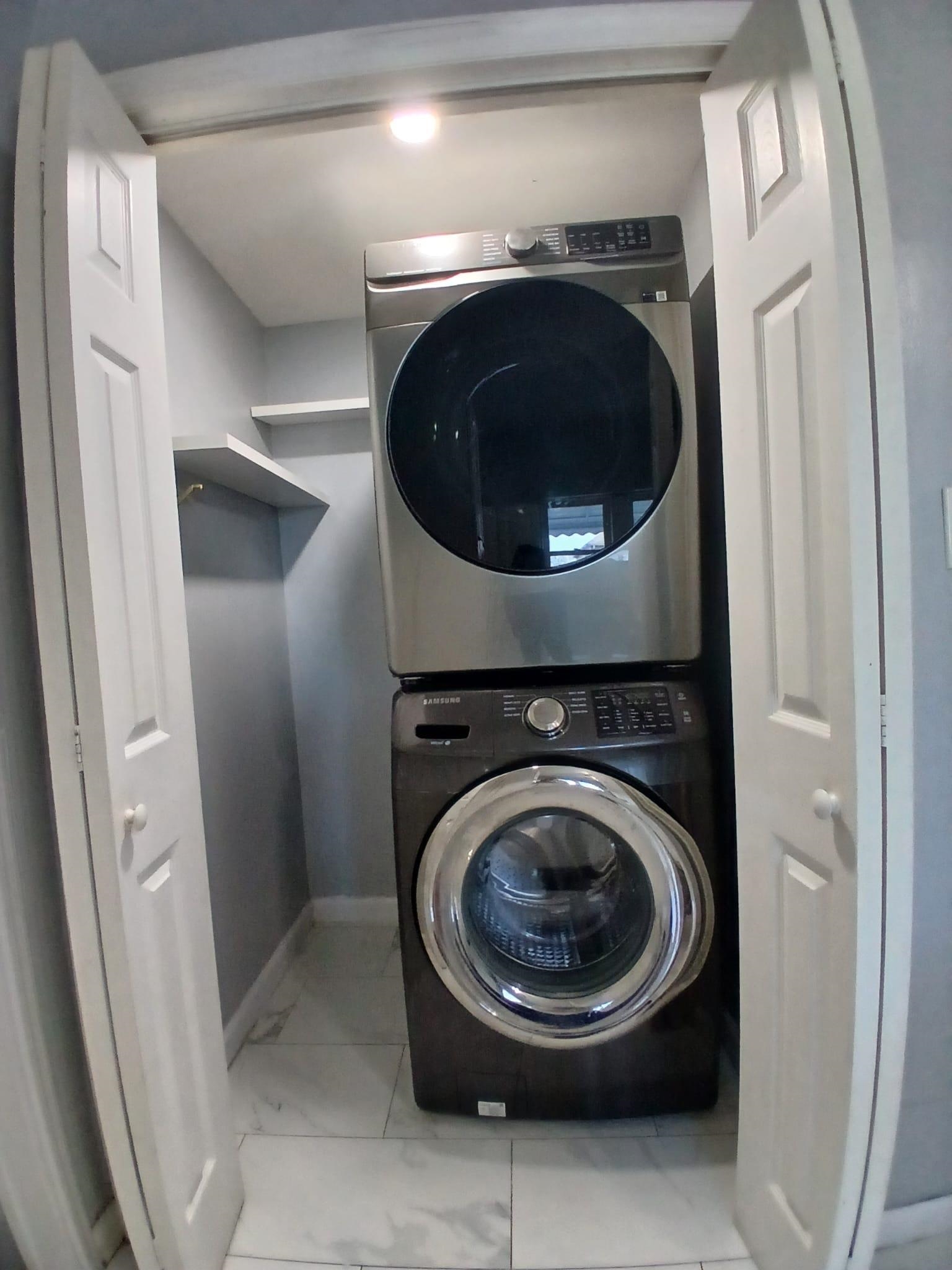 1212 89th Street North Bergen, NJ 07047 - Photo 41 of 41 a utility room with washing machine
