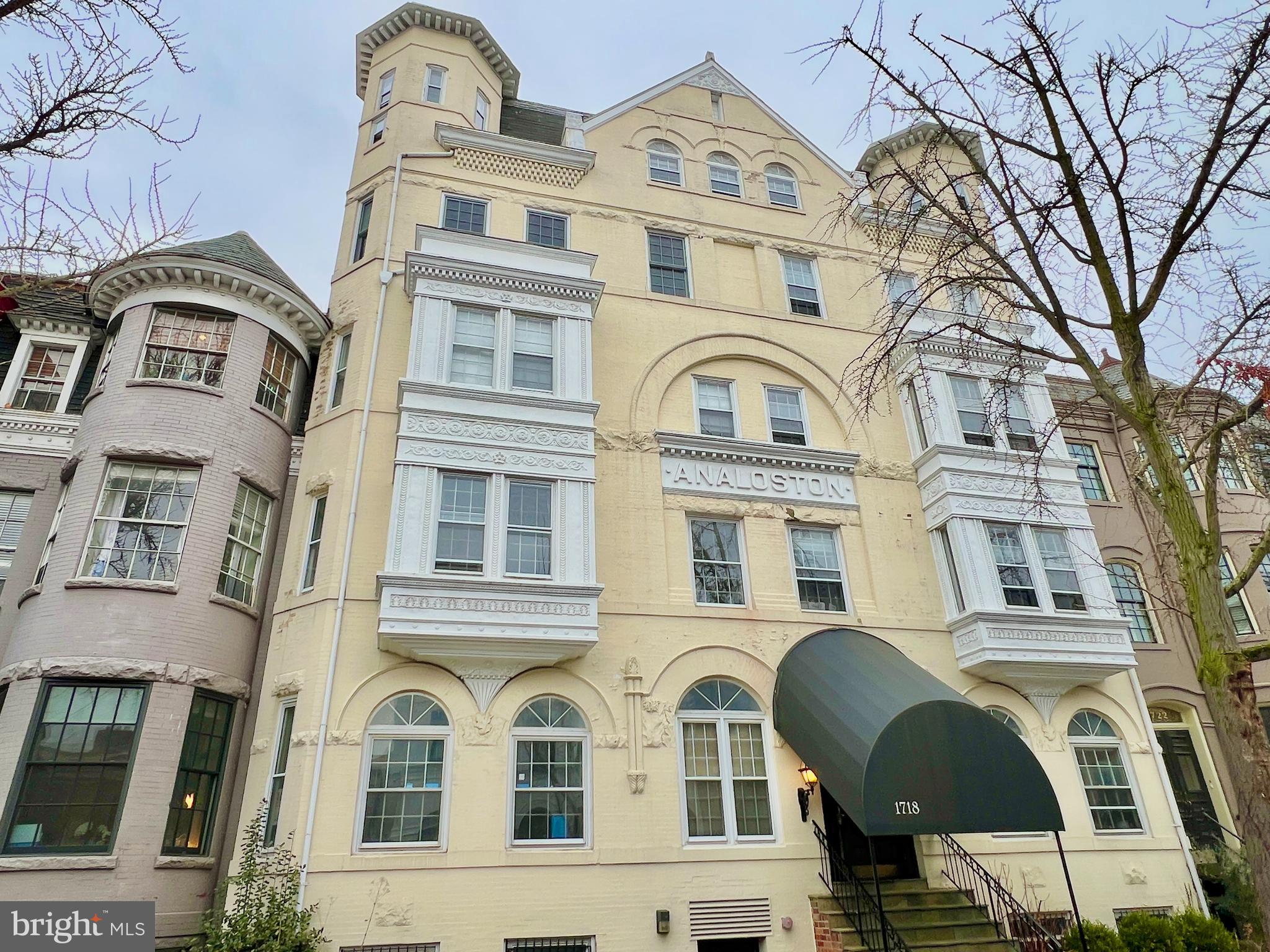 1718 Corcoran Street Northwest, Unit 45 Washington, DC 20009 - Photo 10 of 13 a front view of a multi story residential apartment building