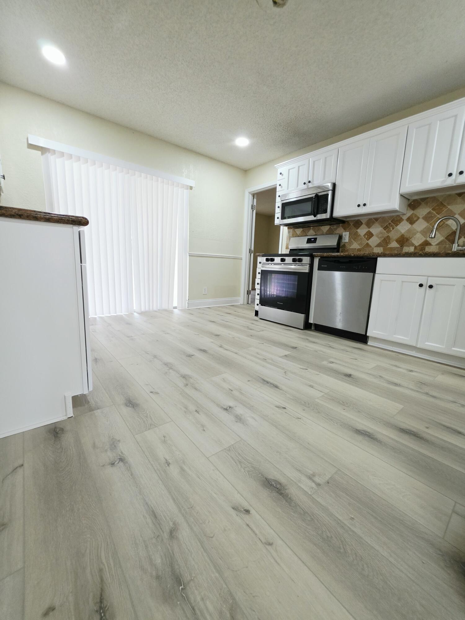 5447 Twin Oakes Road Lake Worth, FL 33463 - Photo 4 of 17 20260702_114742