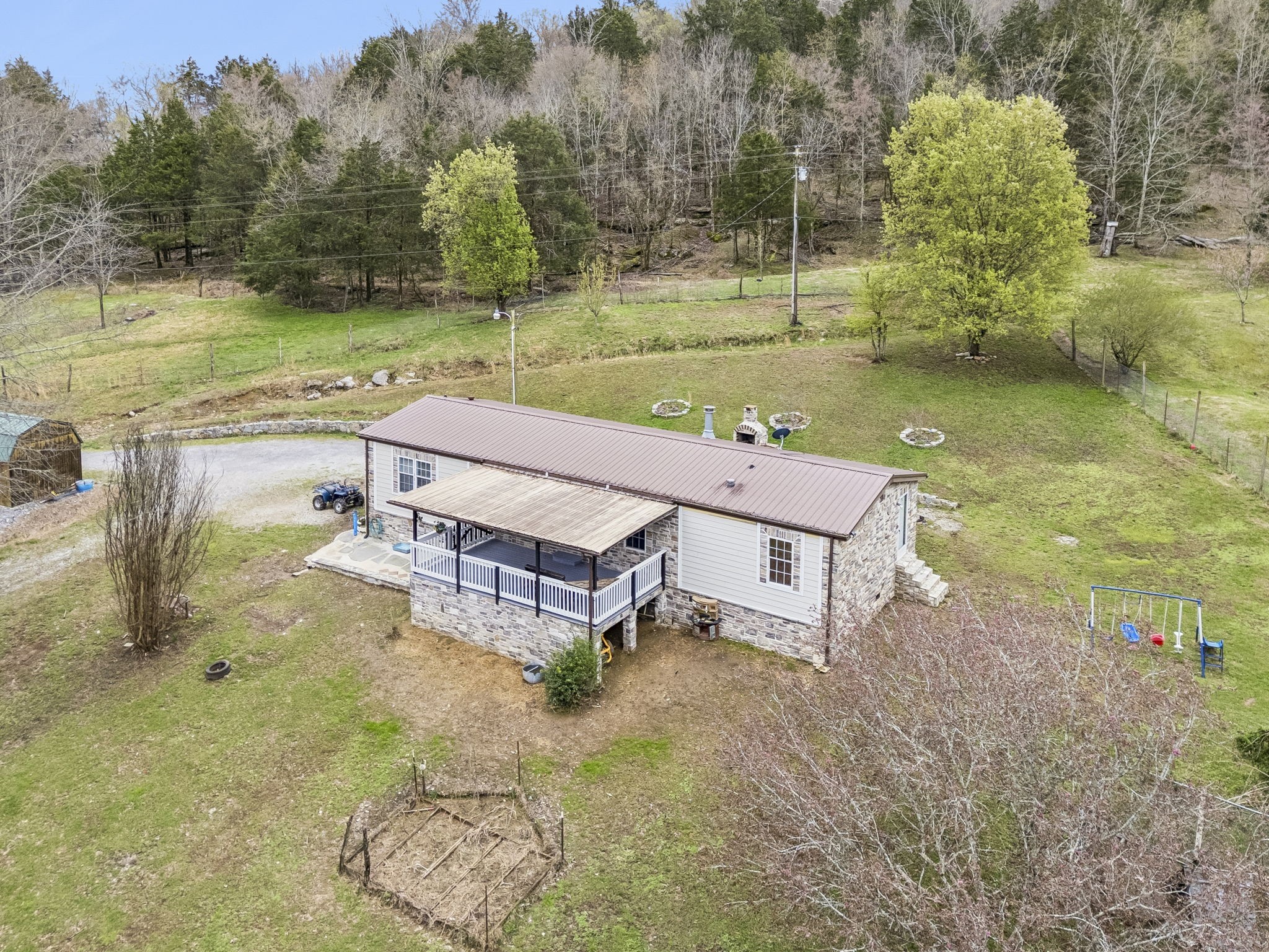 47 Riddleton Circle Riddleton, TN 37151 - Photo 33 of 46 a view of a patio with a yard