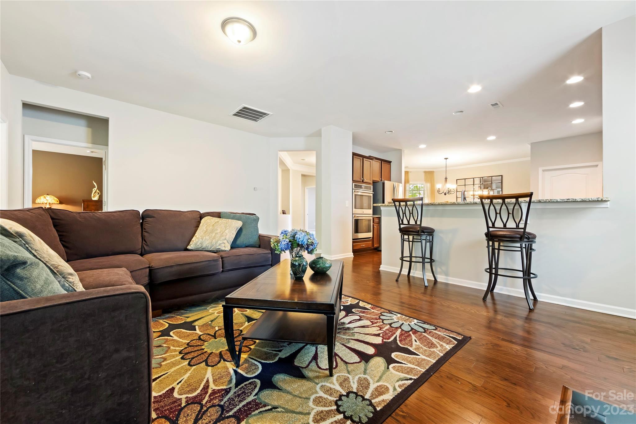 4087 Perth Road Indian Land, SC 29707 - Photo 18 of 46 a living room with furniture and kitchen view