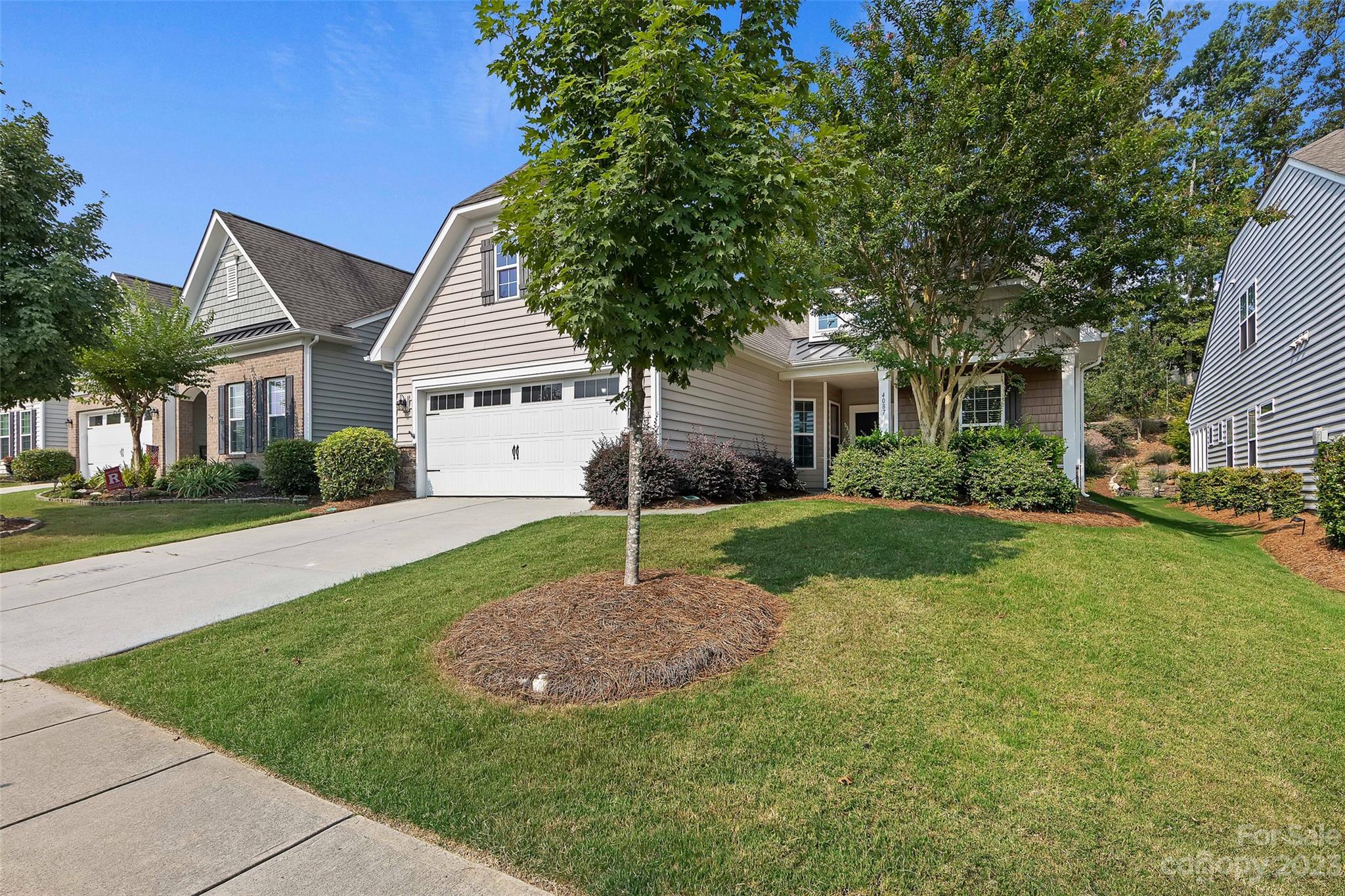 4087 Perth Road Indian Land, SC 29707 - Photo 2 of 46 a view of house in front of a big yard with large trees