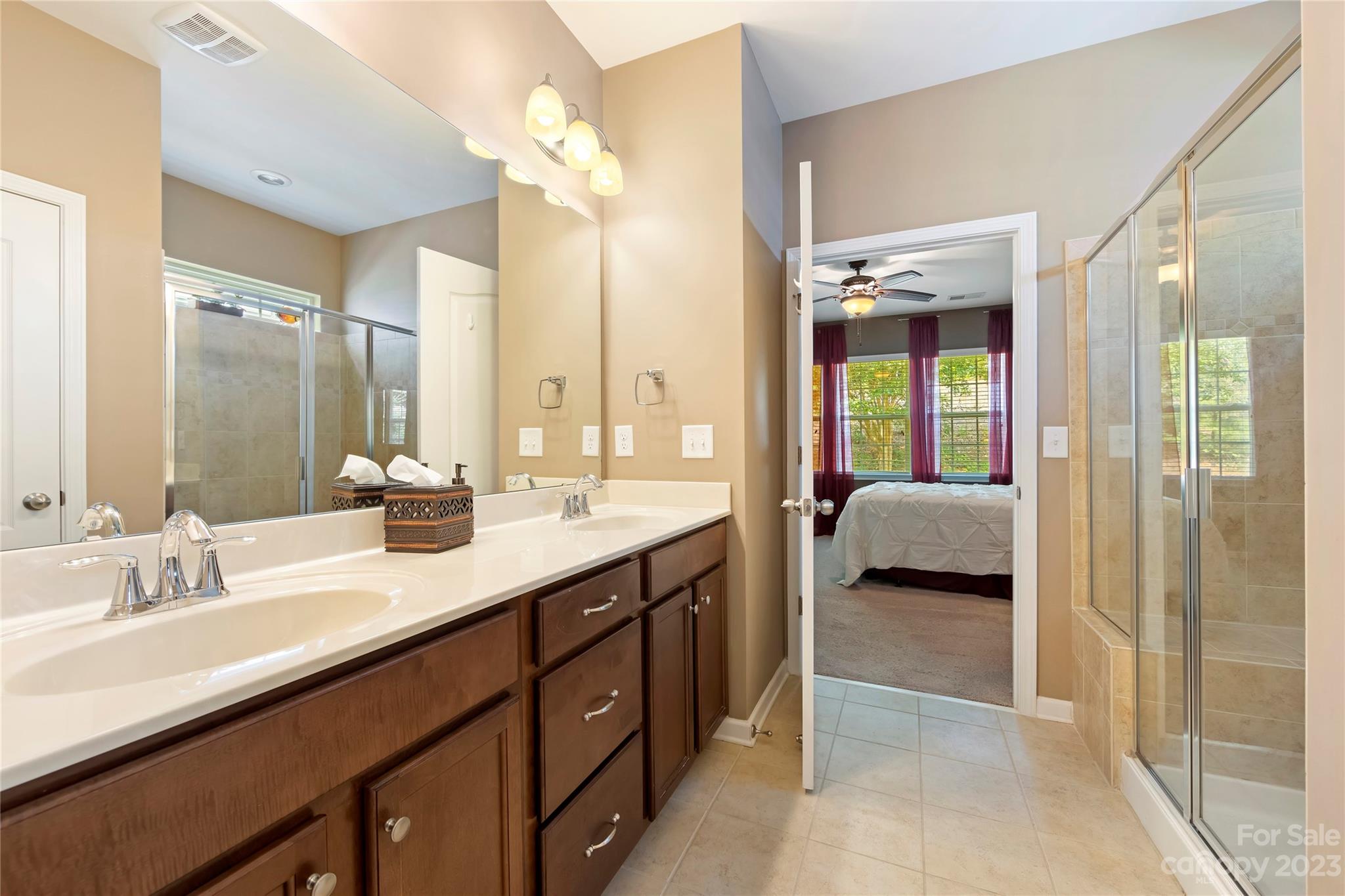 4087 Perth Road Indian Land, SC 29707 - Photo 26 of 46 a en suite bathroom with a double sink and mirror