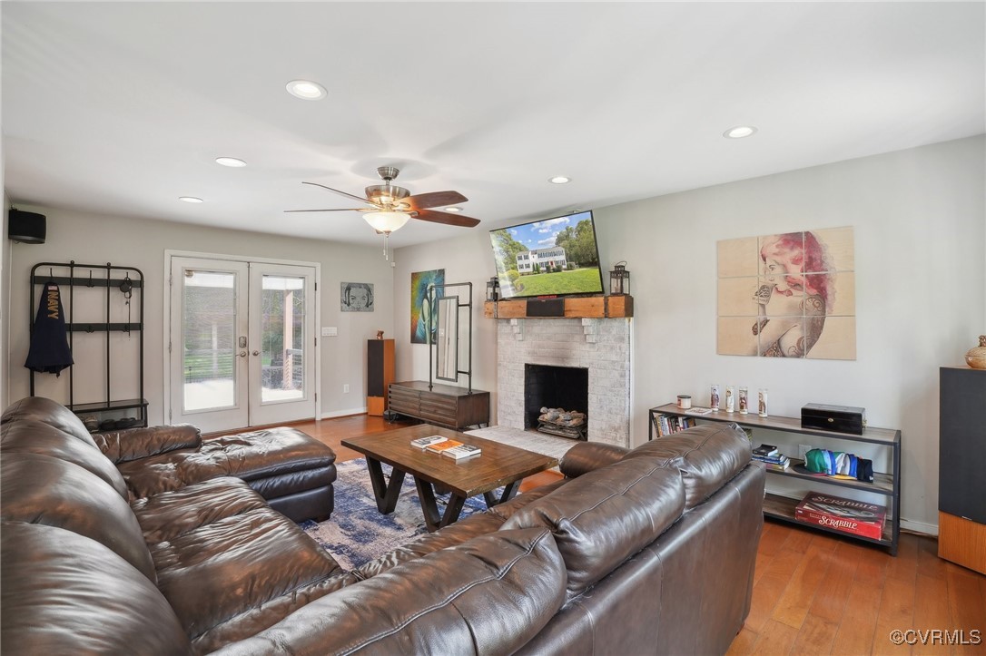 7101 Conifer Road Richmond, VA 23237 - Photo 18 of 50 a living room with furniture and a fireplace