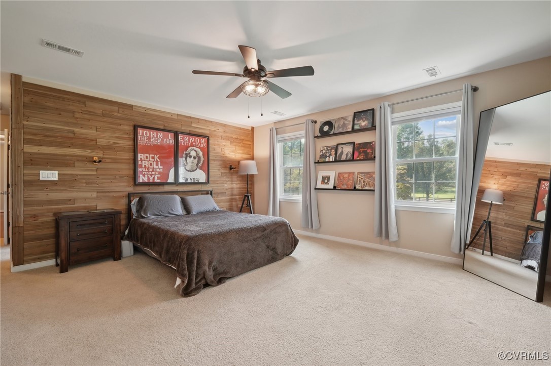 7101 Conifer Road Richmond, VA 23237 - Photo 37 of 50 a living room with furniture and a flat screen tv