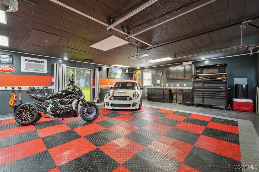 7101 Conifer Road Richmond, VA 23237 - Photo 38 of 50 a car parked in a room