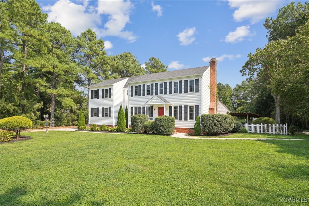 7101 Conifer Road Richmond, VA 23237 - Photo 4 of 50 a view of a house with a yard
