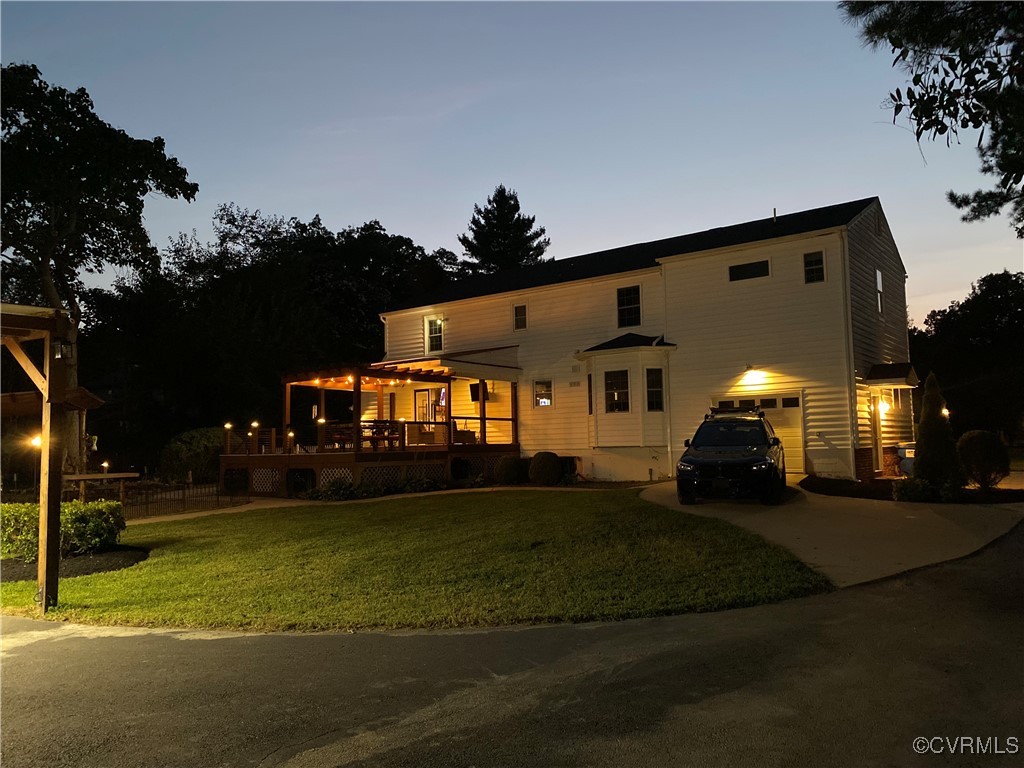 7101 Conifer Road Richmond, VA 23237 - Photo 44 of 50 a front view of a house with a yard
