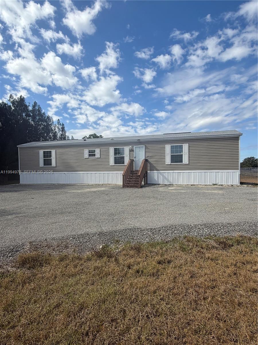 130 North Granja Street Clewiston, FL 33440 - Photo 1 of 10 a view of house with outdoor space