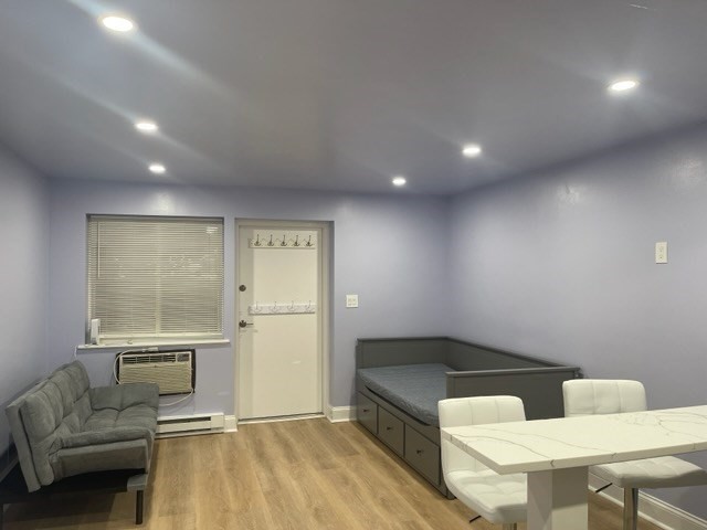 45 Oval Road, Unit 6 Quincy, MA 02170 - Photo 2 of 9 a living room with a couch and a coffee table