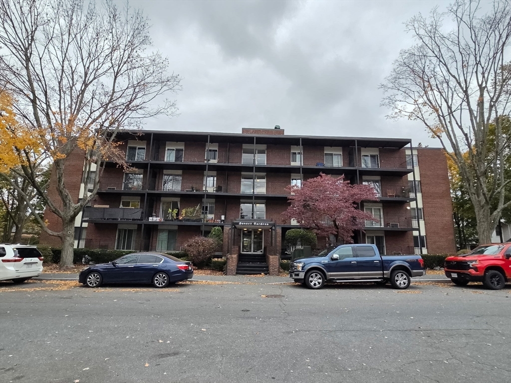 45 Oval Road, Unit 6 Quincy, MA 02170 - Photo 9 of 9 a car parked in front of a building