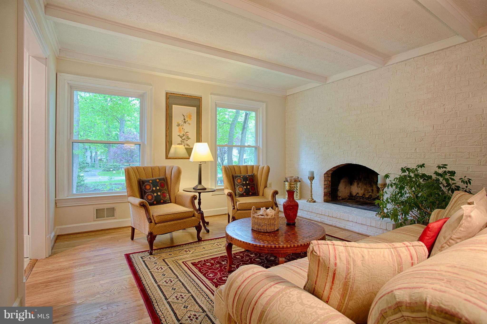 11311 Fieldstone Lane Reston, VA 20191 - Photo 3 of 30 a living room with furniture and a fireplace
