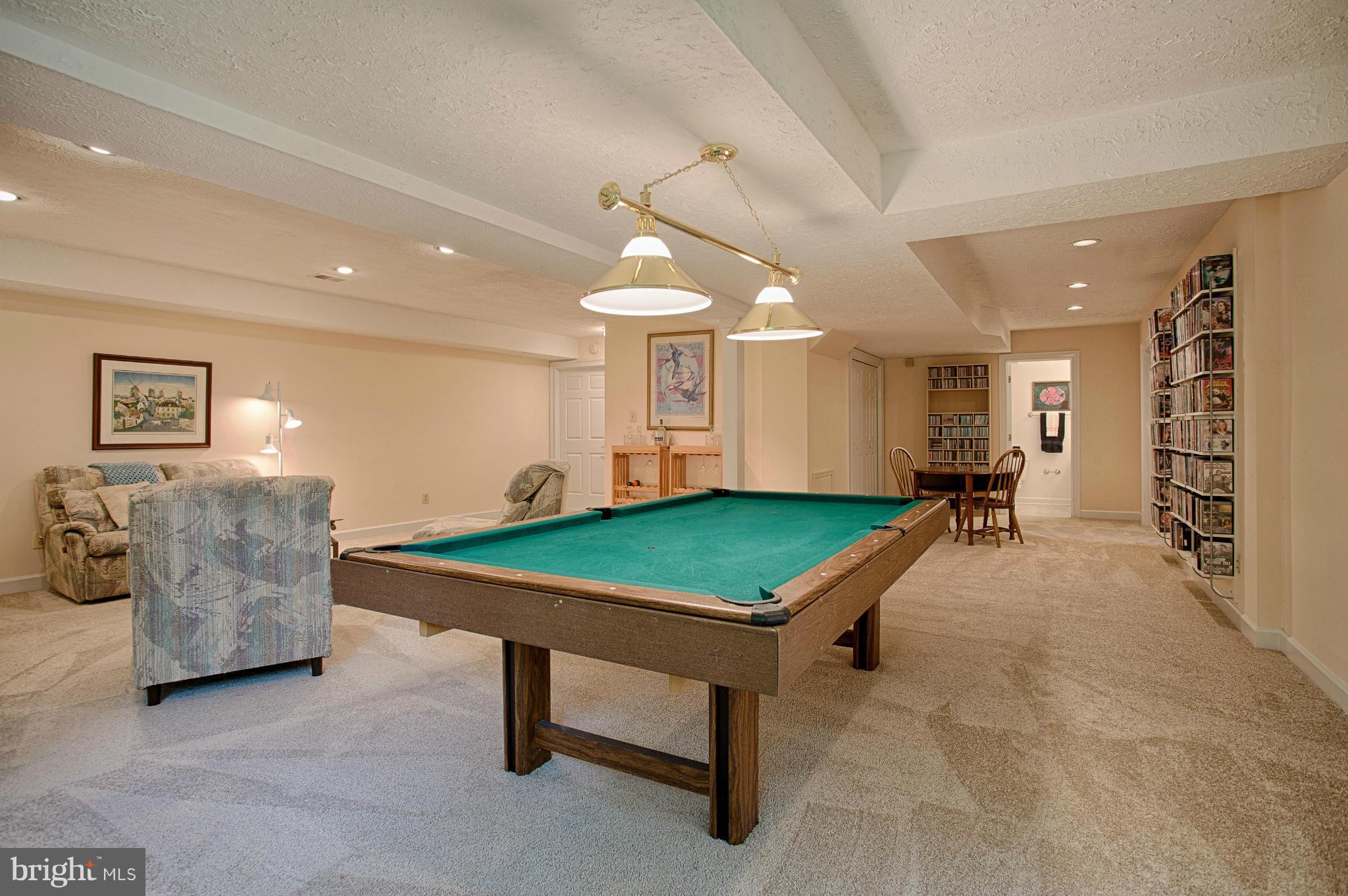 11311 Fieldstone Lane Reston, VA 20191 - Photo 23 of 30 a room with pool table and windows