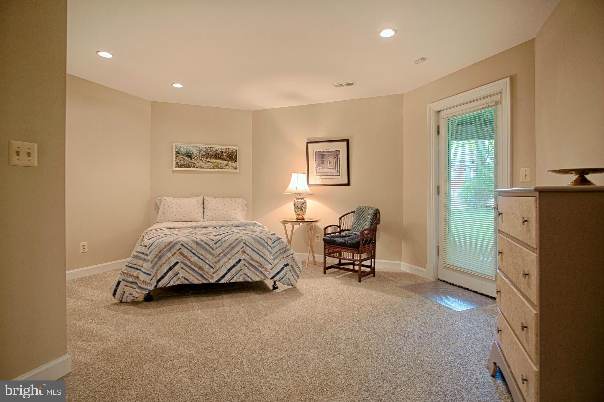 11311 Fieldstone Lane Reston, VA 20191 - Photo 24 of 30 a bedroom with a bed and furniture