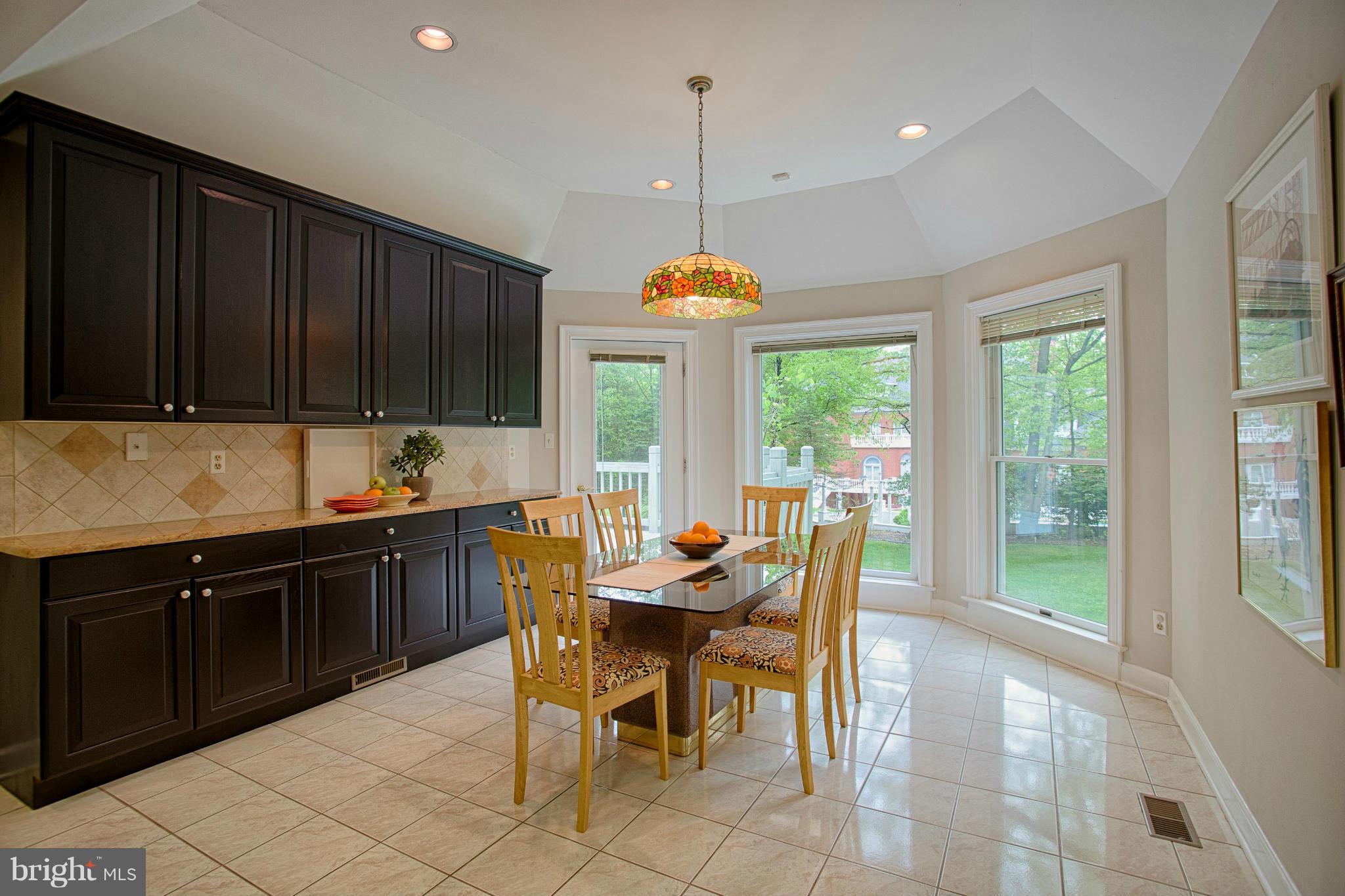 11311 Fieldstone Lane Reston, VA 20191 - Photo 7 of 30 a view of a dining room with furniture window and outside view