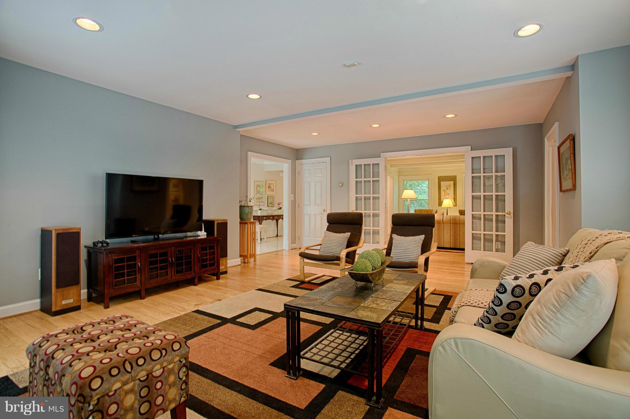 11311 Fieldstone Lane Reston, VA 20191 - Photo 9 of 30 a living room with furniture and a flat screen tv