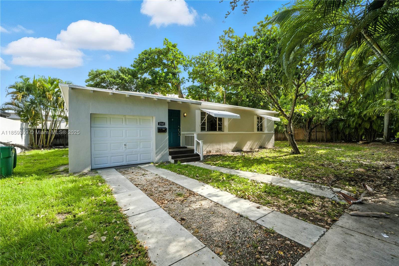 2545 Southwest 27th Lane Miami, FL 33133 - Photo 2 of 26 a view of a house with backyard