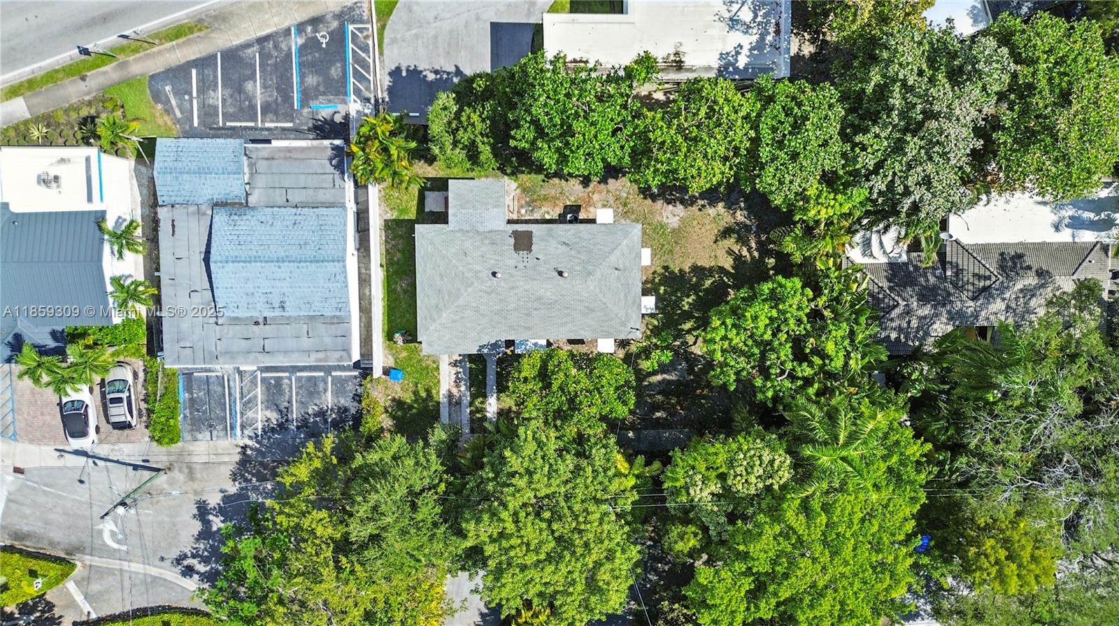 2545 Southwest 27th Lane Miami, FL 33133 - Photo 23 of 26 an aerial view of a house with a yard