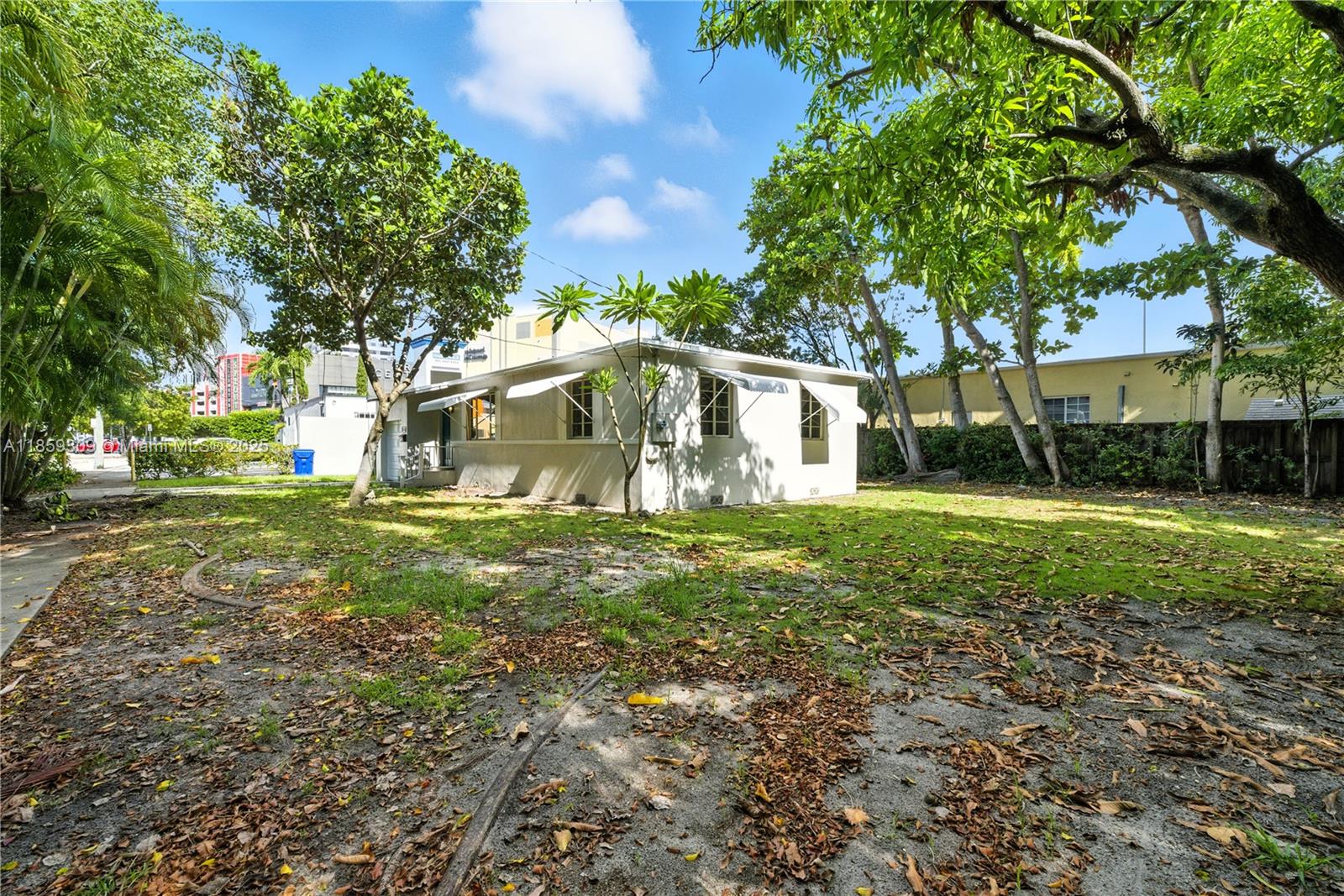 2545 Southwest 27th Lane Miami, FL 33133 - Photo 5 of 26 a view of a house with a yard