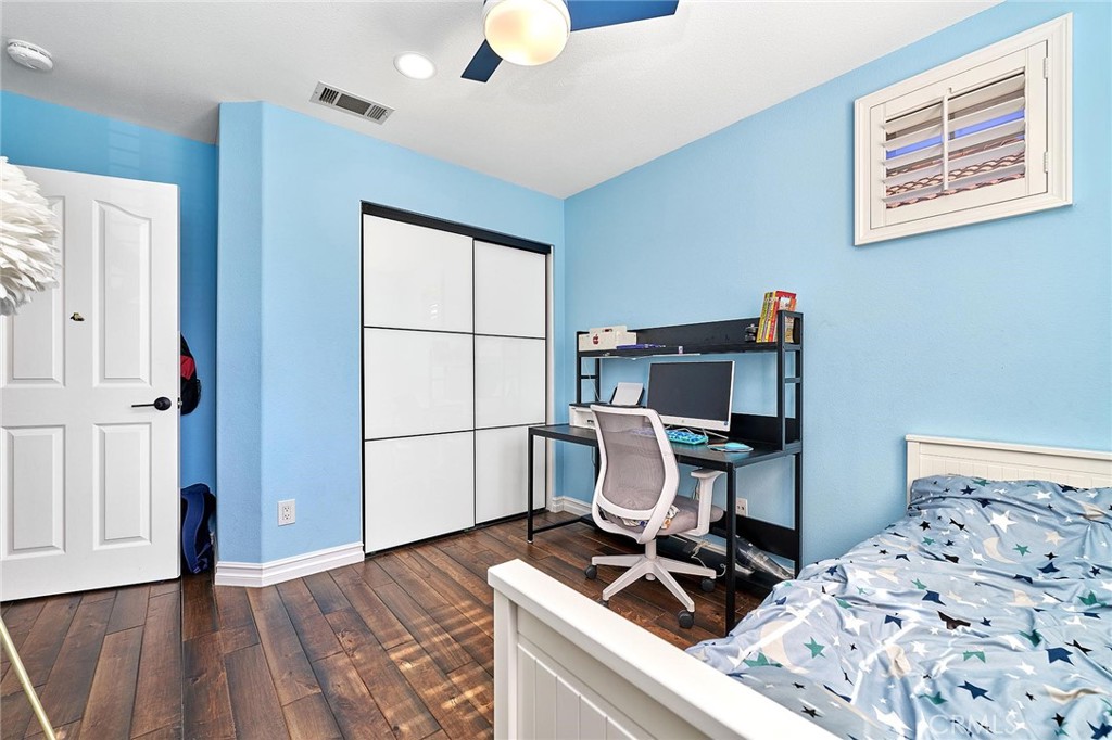 25553 Fitzgerald Avenue Stevenson Ranch, CA 91381 - Photo 32 of 40 a workspace with furniture and wooden floor