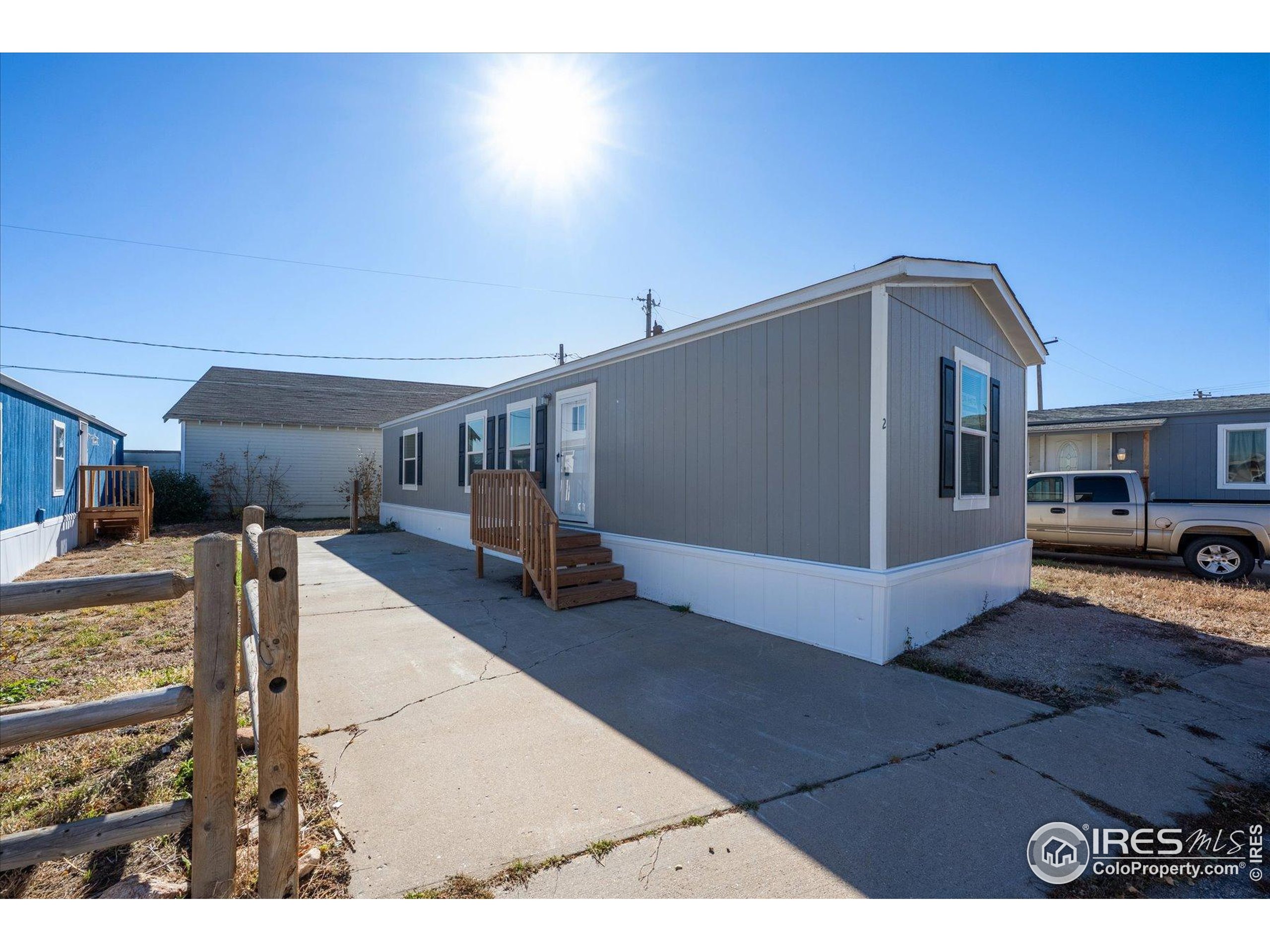 830 1st Street, Unit 2 Pierce, CO 80650 - Photo 2 of 16 a living room with furniture