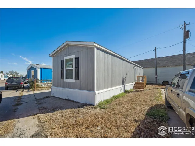a view of a livingroom with wooden floor