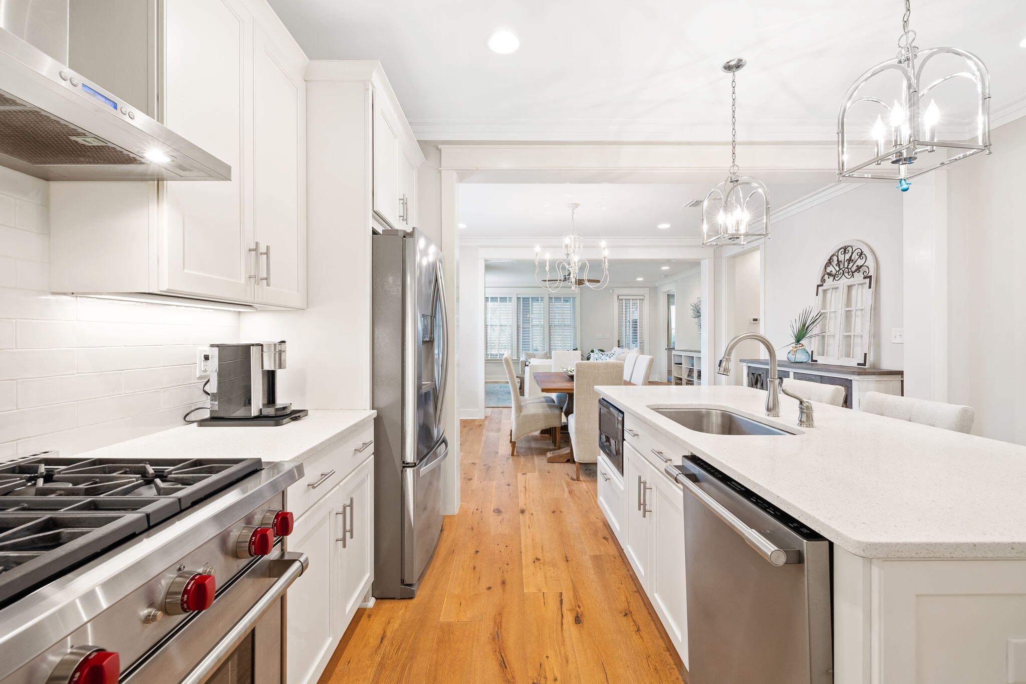178 Jack Knife Drive Inlet Beach, FL 32461 - Photo 26 of 69 a large kitchen with kitchen island a stove a sink a refrigerator and a wooden floor