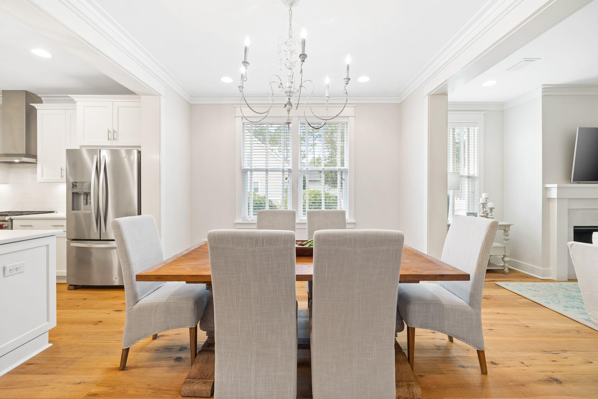 178 Jack Knife Drive Inlet Beach, FL 32461 - Photo 31 of 69 a view of a dining room with furniture a chandelier and wooden floor