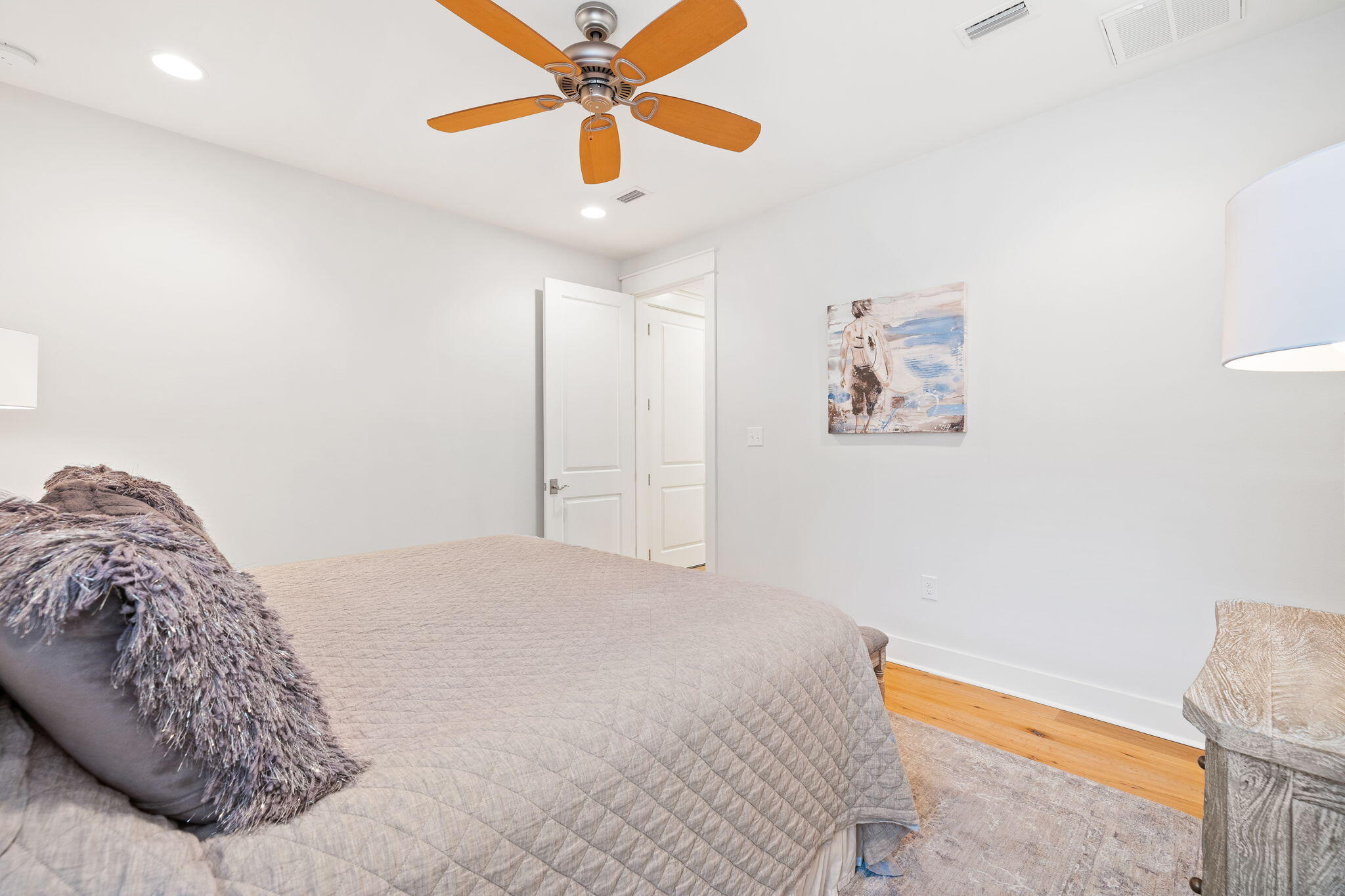 178 Jack Knife Drive Inlet Beach, FL 32461 - Photo 50 of 69 a bedroom with a bed and a chandelier