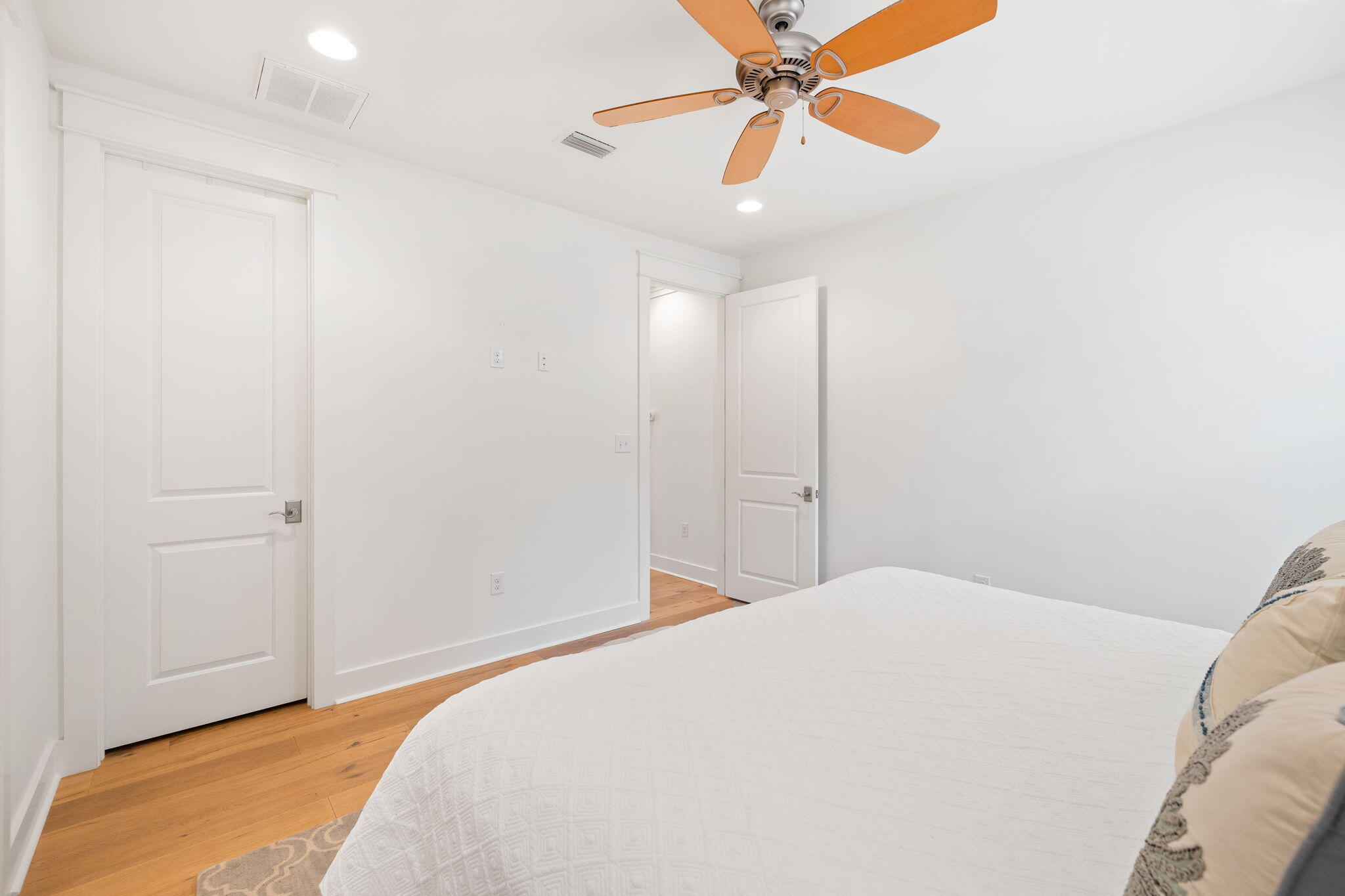 178 Jack Knife Drive Inlet Beach, FL 32461 - Photo 52 of 69 a bedroom with a bed and a chandelier