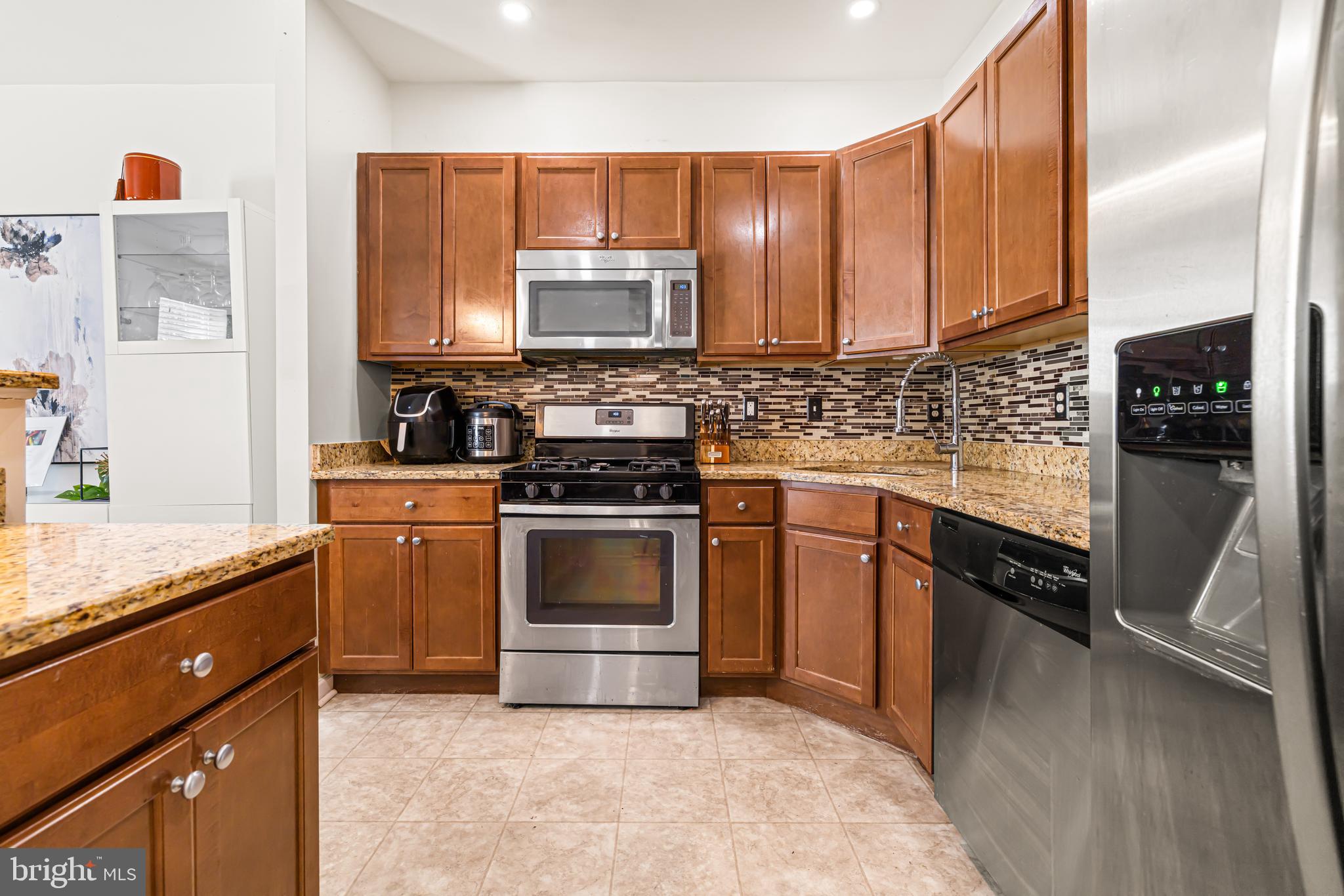 303 Ross Court Wyncote, PA 19095 - Photo 10 of 26 Bright kitchen with stainless steel appliances