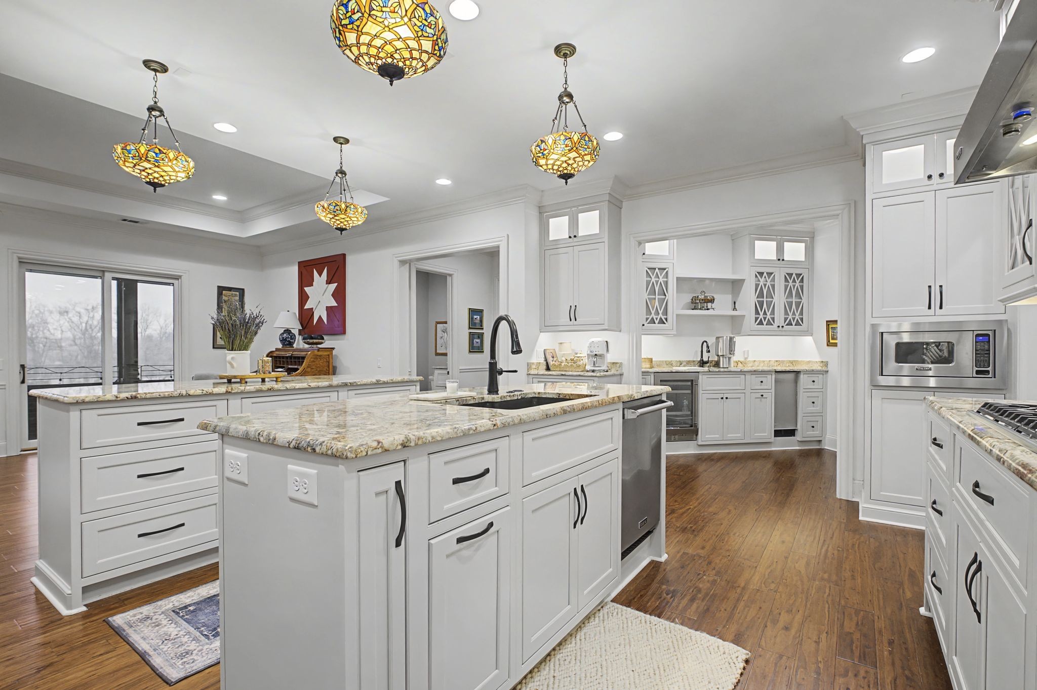 7100 Marsh Hawk Court Arrington, TN 37014 - Photo 22 of 51 a kitchen with stainless steel appliances granite countertop a stove oven and a refrigerator