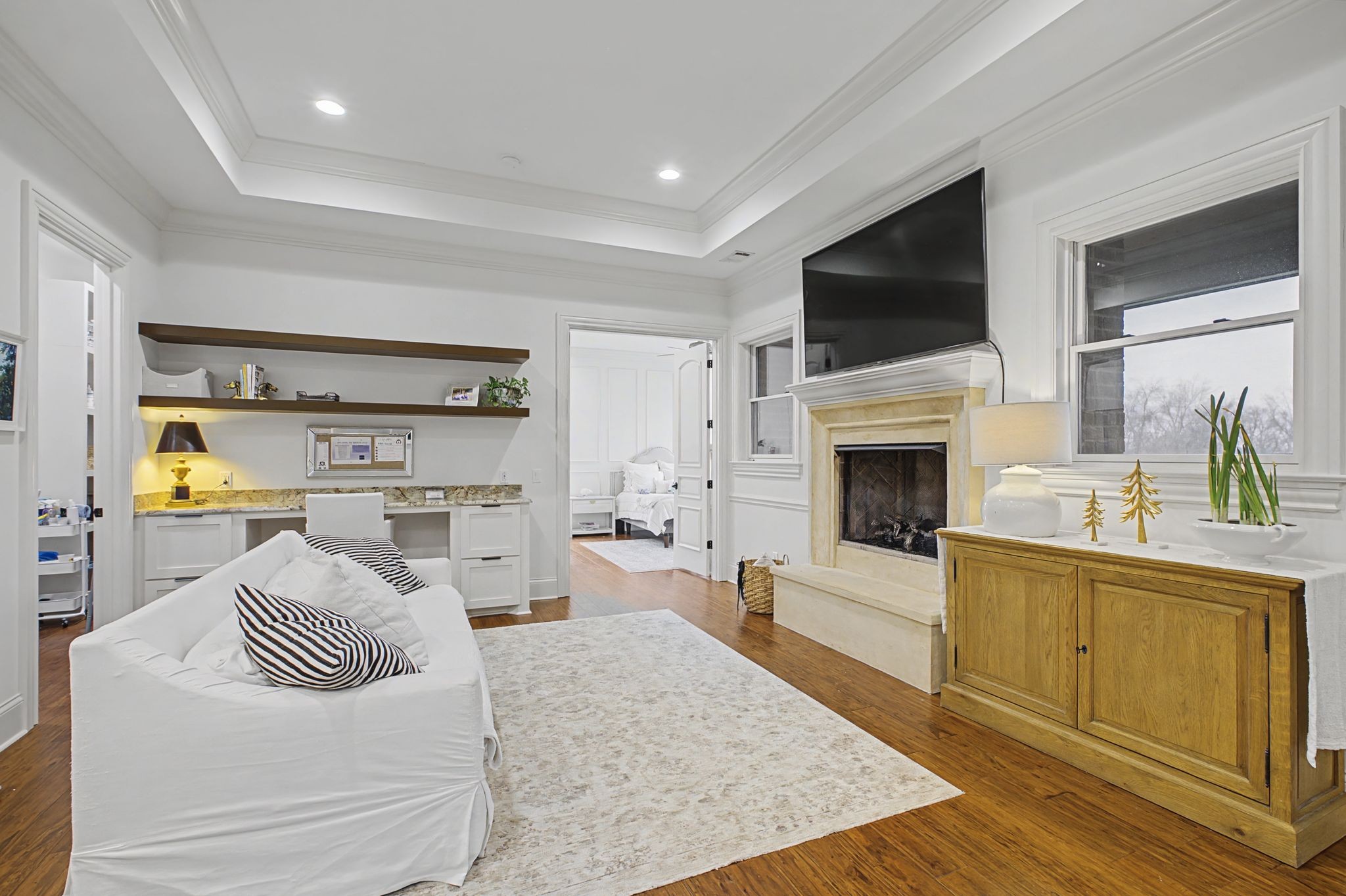 7100 Marsh Hawk Court Arrington, TN 37014 - Photo 35 of 51 a living room with furniture fireplace and flat screen tv