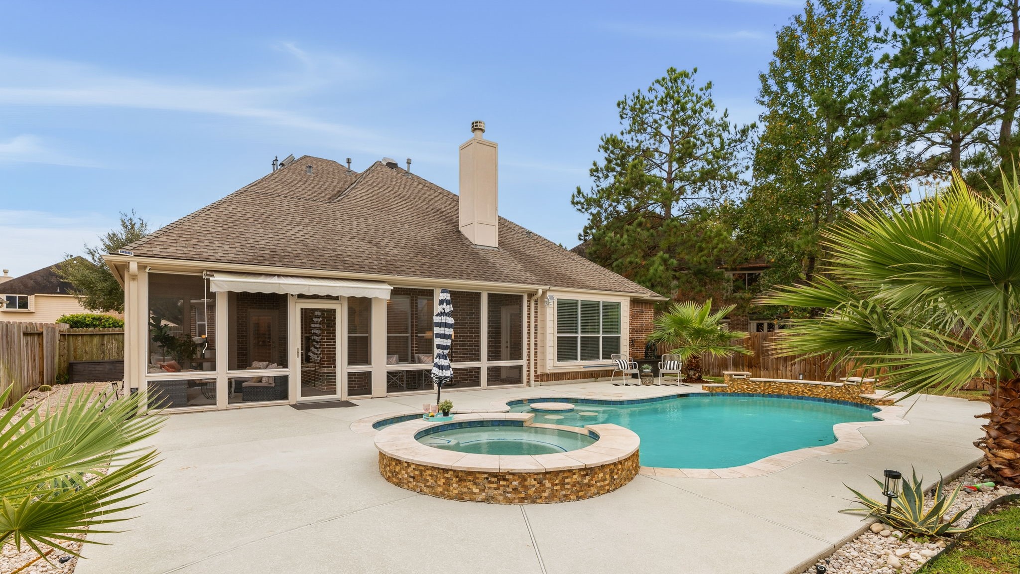 307 Arbor Ridge Lane Conroe, TX 77384 - Photo 38 of 50 a house view with a garden space