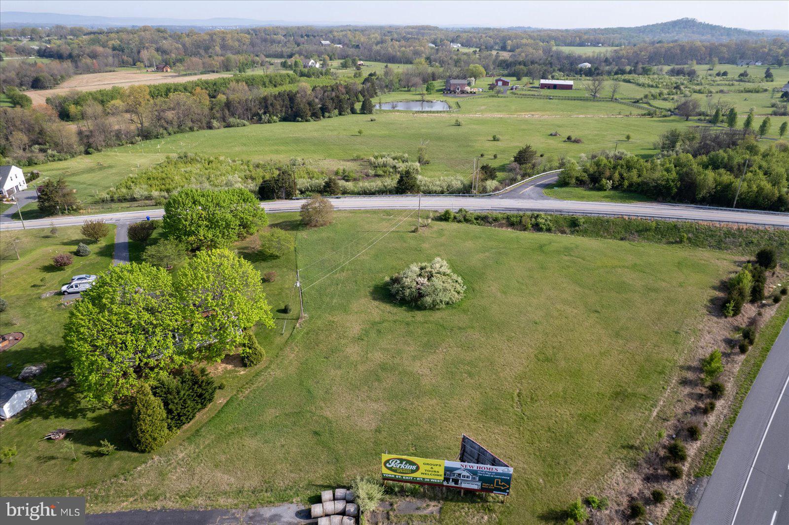 680 Barlow Greenmount Road Gettysburg, PA 17325 - Photo 4 of 5 an aerial view of a houses with a yard