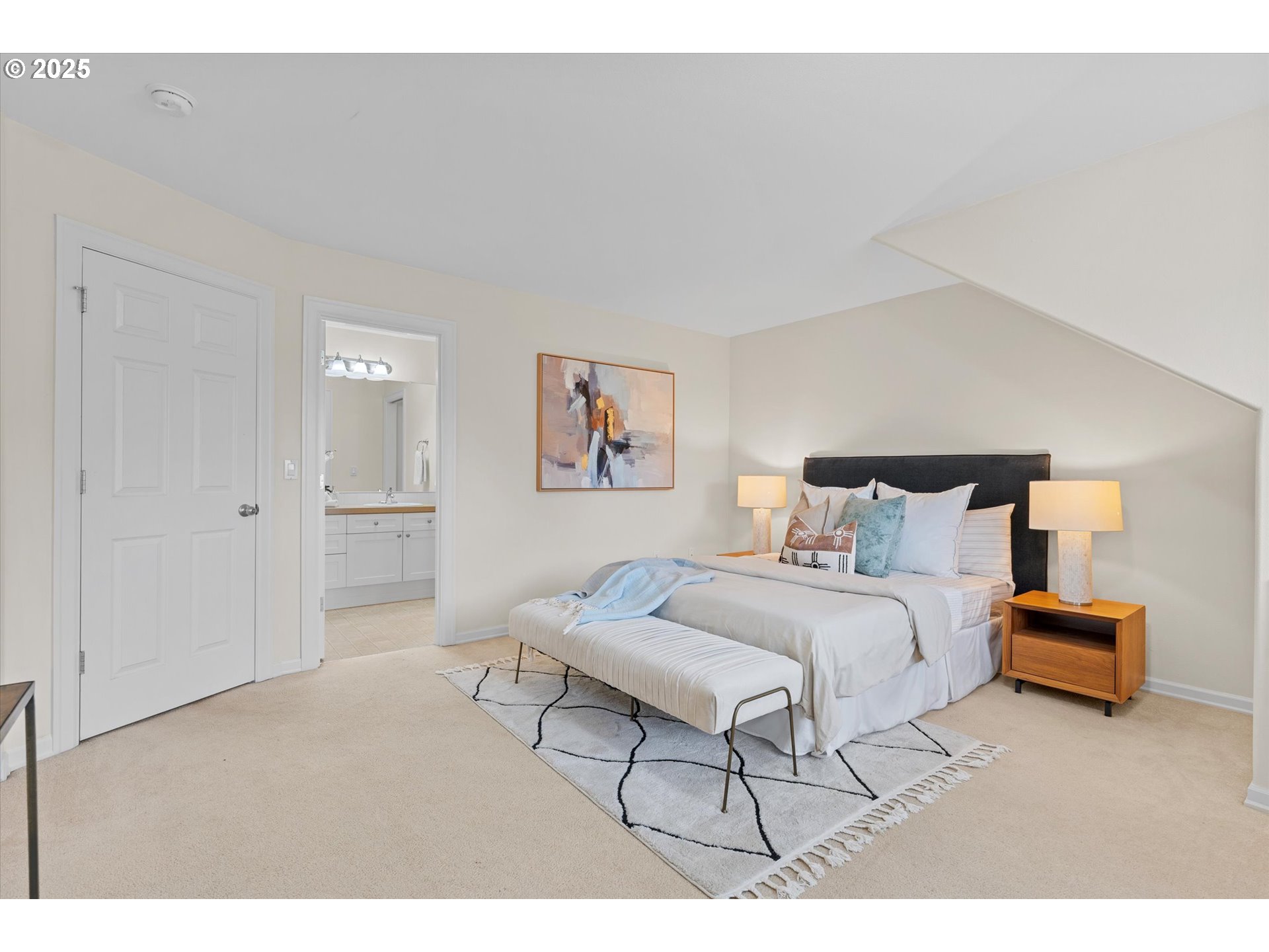 2926 Southwest Texas Street Portland, OR 97219 - Photo 11 of 16 a bedroom with a bed and a table