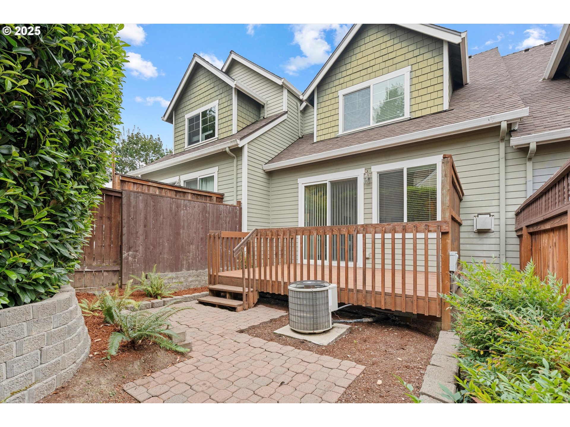 2926 Southwest Texas Street Portland, OR 97219 - Photo 16 of 16 a view of a chair and table in backyard of the house
