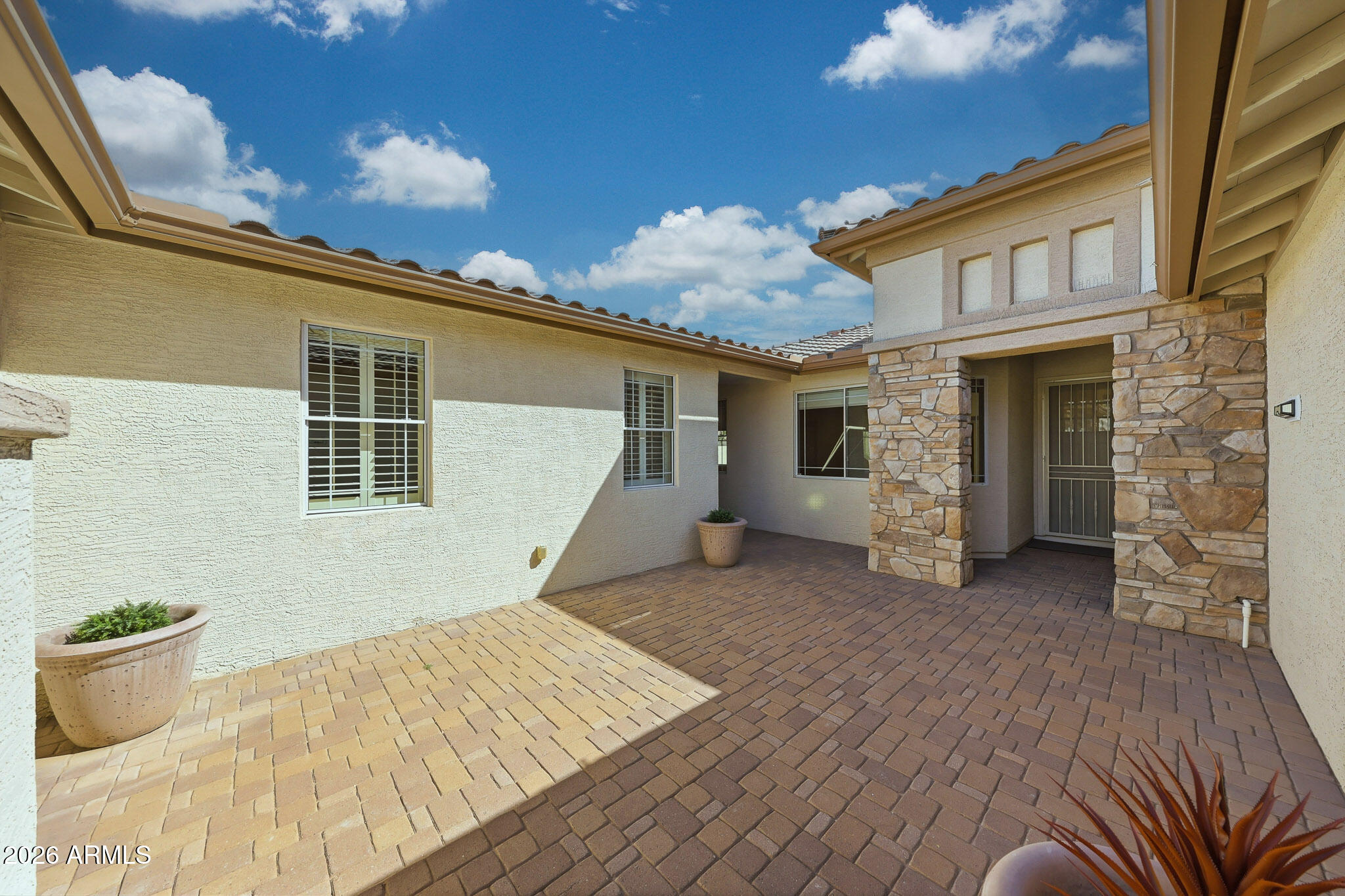 16231 West Cheery Lynn Road Goodyear, AZ 85395 - Photo 5 of 43 Pavered Courtyard
