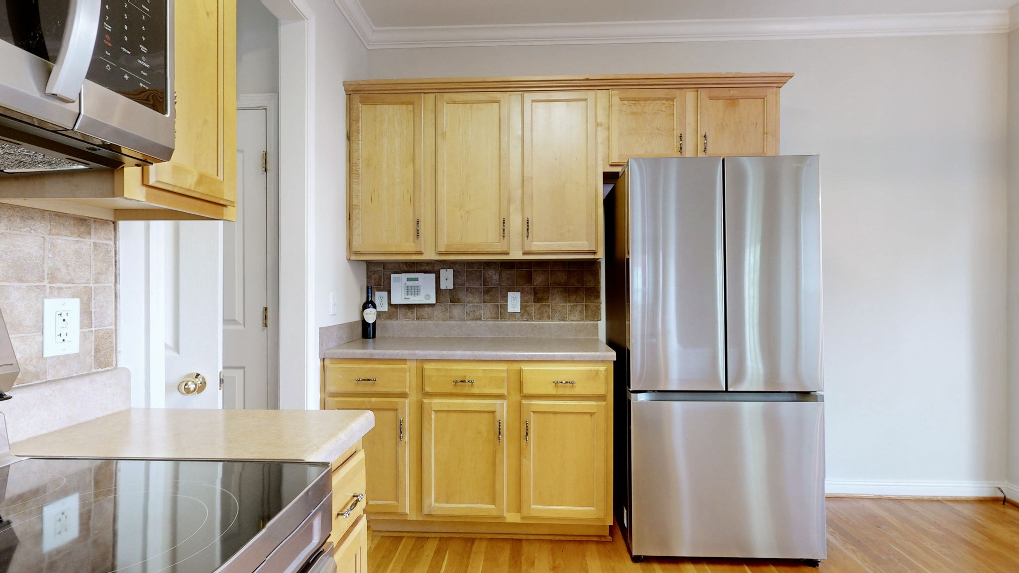 1138 Culpepper Circle Franklin, TN 37064 - Photo 11 of 46 a kitchen with stainless steel appliances granite countertop a refrigerator and a stove