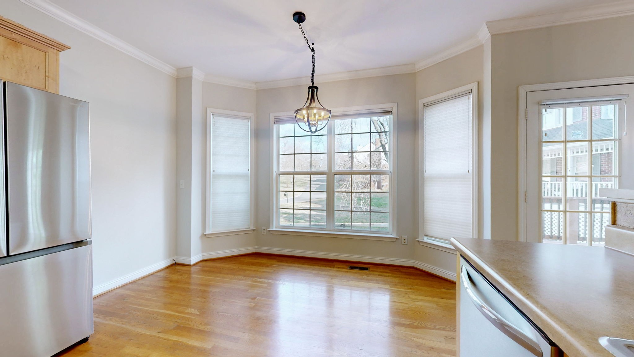 1138 Culpepper Circle Franklin, TN 37064 - Photo 12 of 46 a view of empty room with wooden floor and fan