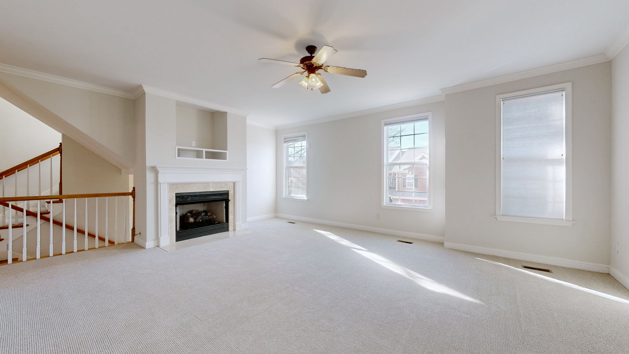 1138 Culpepper Circle Franklin, TN 37064 - Photo 16 of 46 a view of an empty room with a fireplace and a window