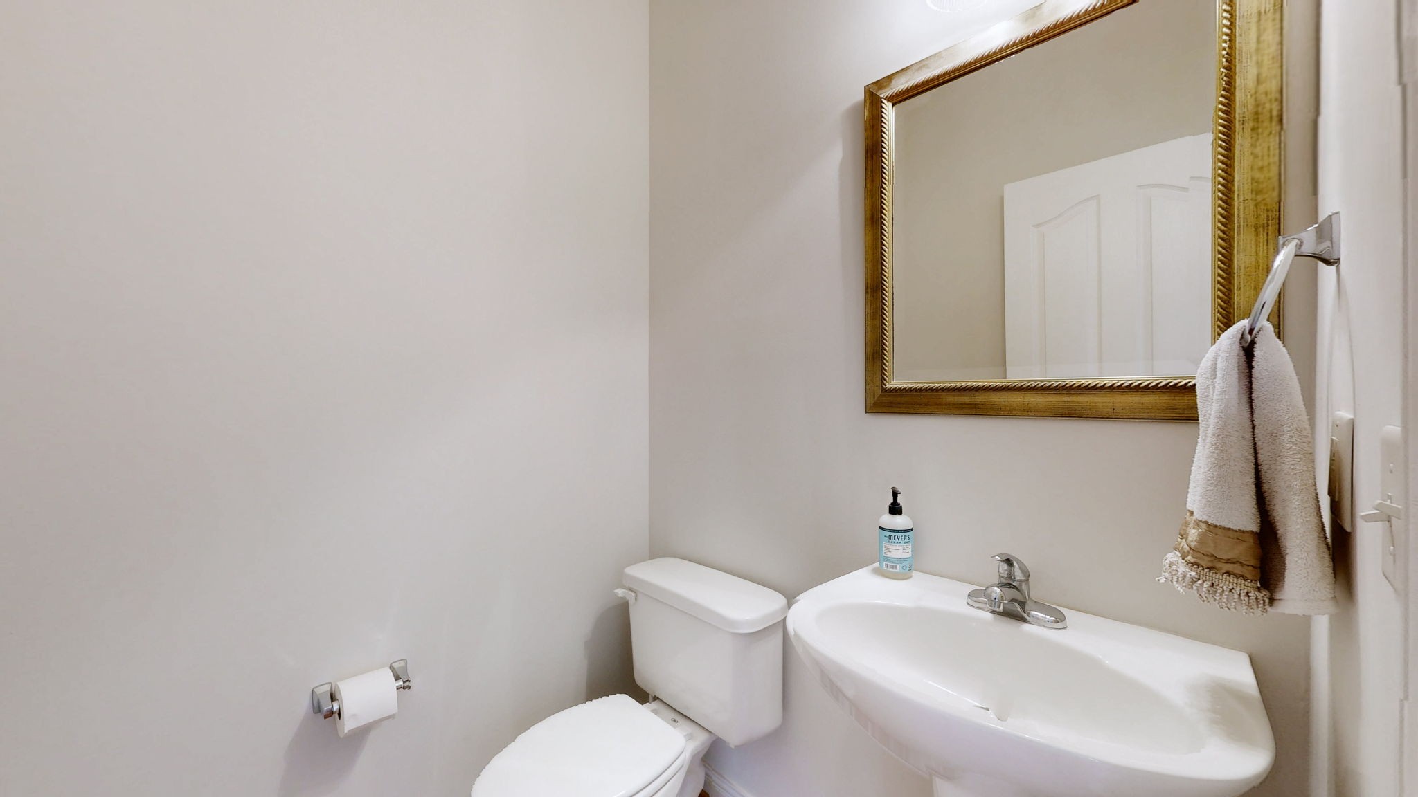 1138 Culpepper Circle Franklin, TN 37064 - Photo 18 of 46 a bathroom with a toilet sink and mirror