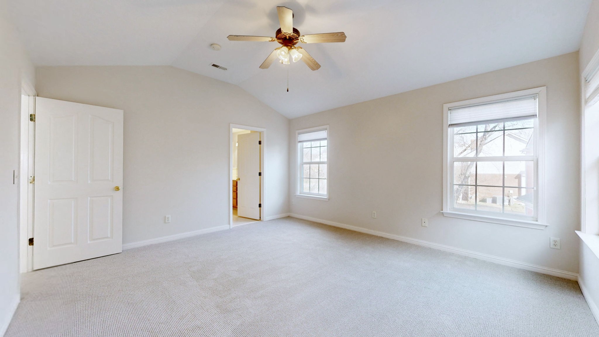 1138 Culpepper Circle Franklin, TN 37064 - Photo 22 of 46 an empty room with chandelier fan and windows